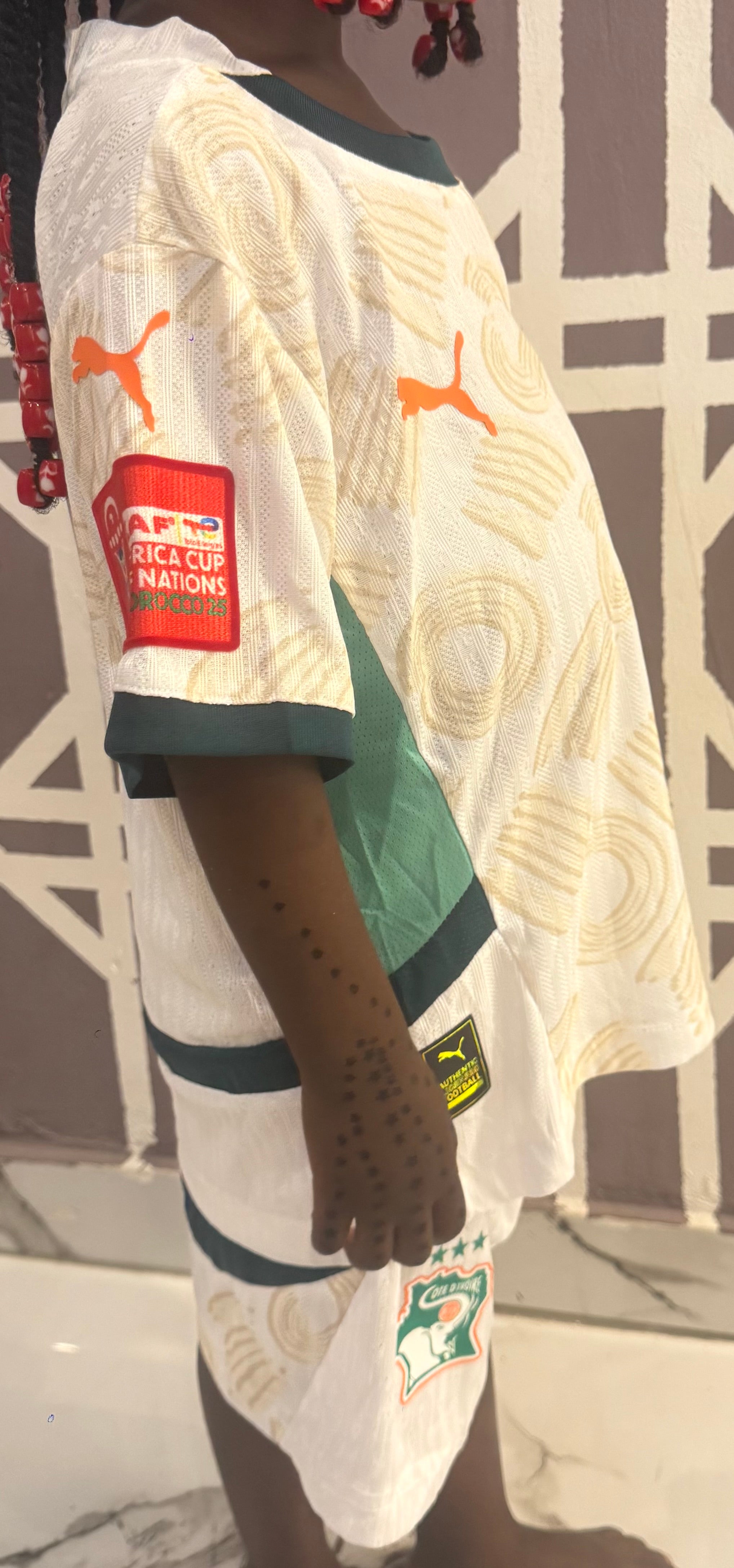 Maillot de côte d'Ivoire pro max pour les enfants , avec le logo de la Can . Toute les tailles disponibles .