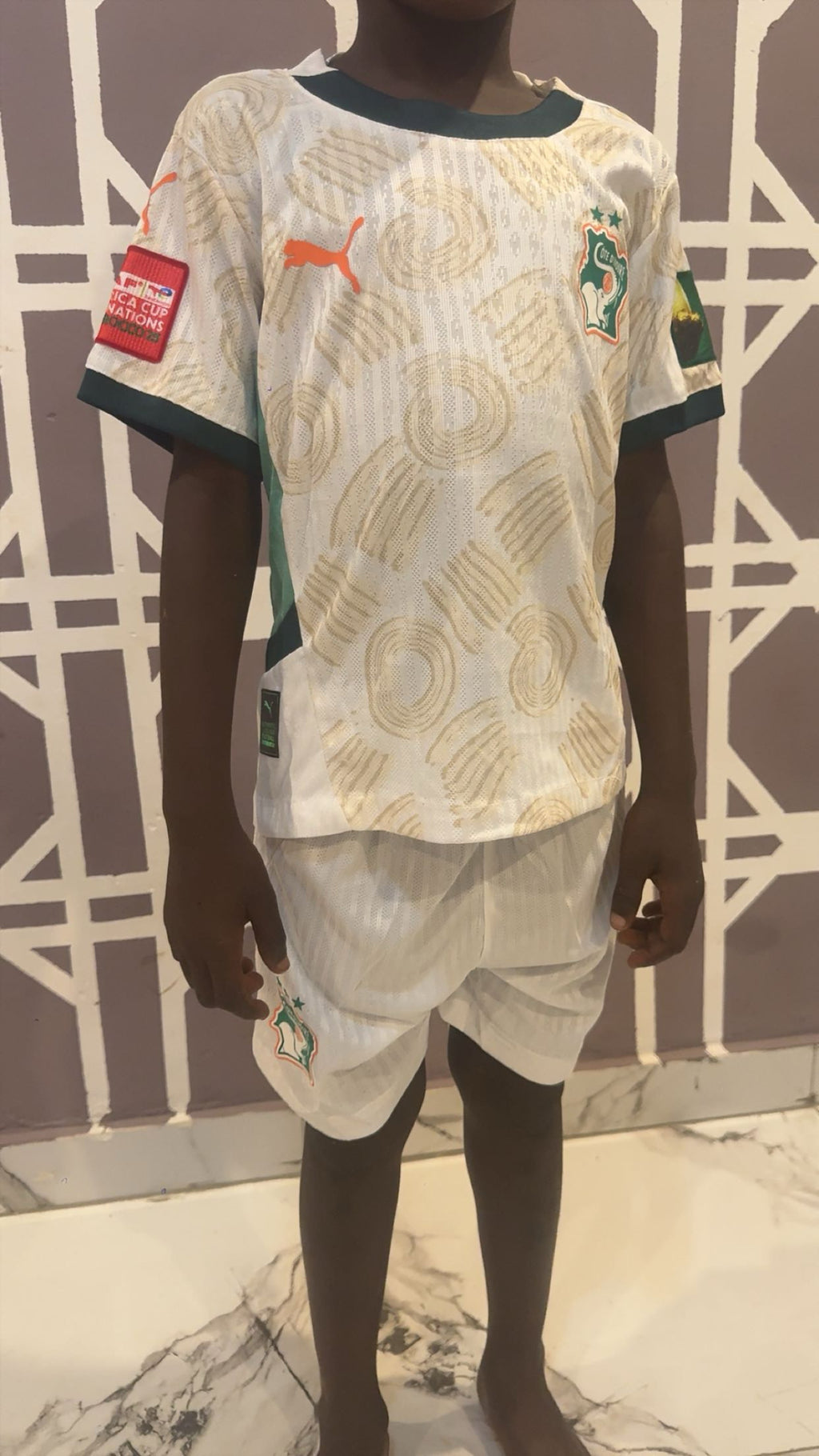 Maillot de côte d'Ivoire pro max pour les enfants , avec le logo de la Can . Toute les tailles disponibles .