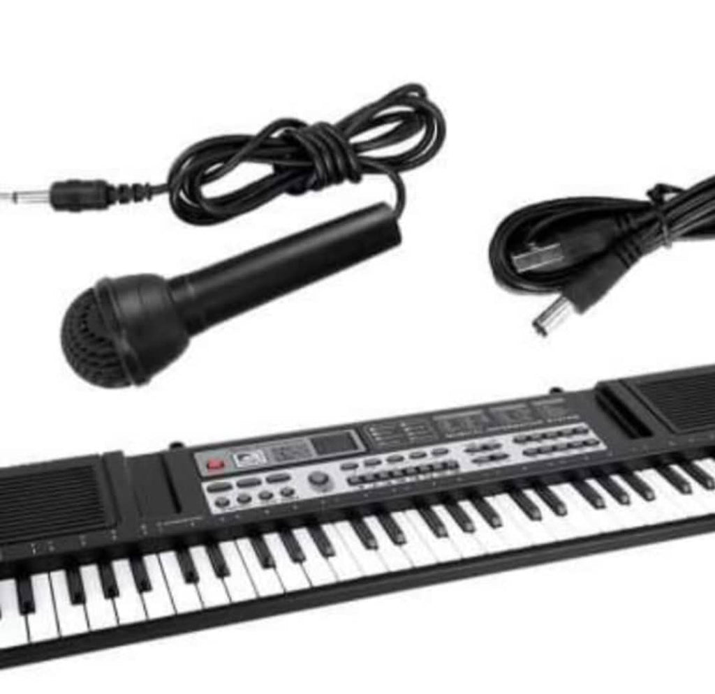 Piano apprentissage pour enfants et grande personne , 61 touches et micro , ça prends clé USB .