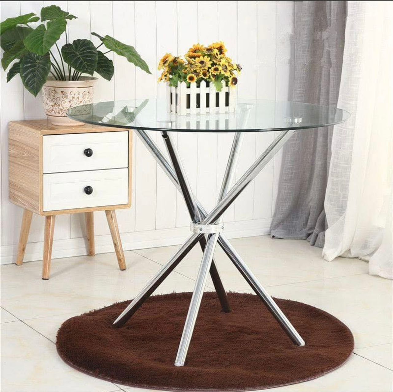 Promo : 18000f .                         Table de salle à manger ronde de luxe moderne en métal et verre et très solide .